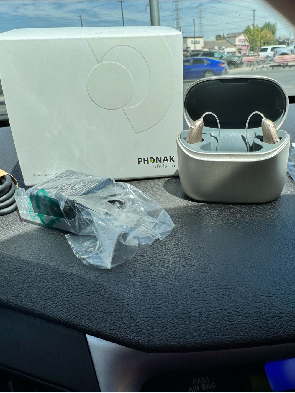 Rechargeable Hearing Aids with Silver Charging Case